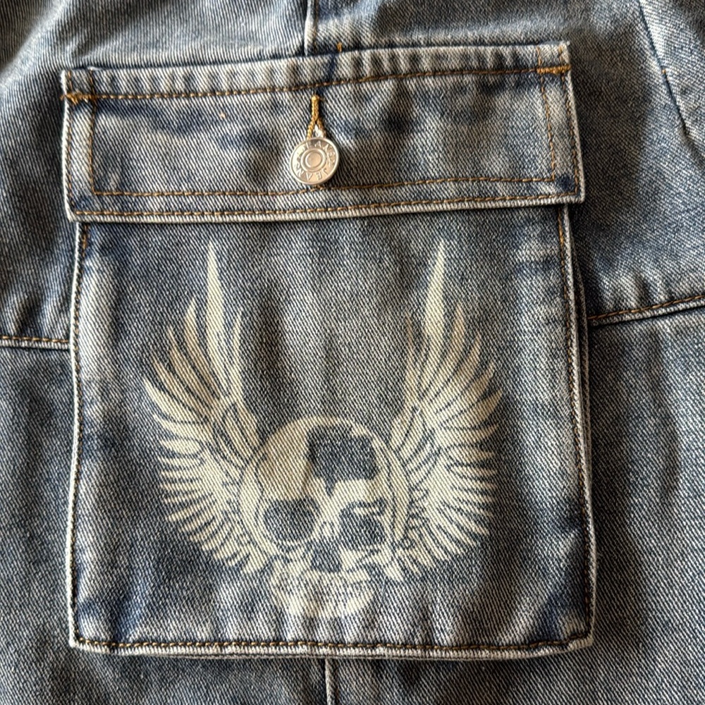 Romwe denim mini skirt with skeleton wings size small
